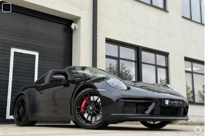 Black Porsche 911 (992) Targa 4 GTS at a dealer in Belgium